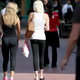 MIAMI BEACH, FL - FEBRUARY 12: A woman wearing yoga pants walk down the street on February 12, 2015 in Miami Beach, Florida. On Tuesday, Montana state Rep. David Moore introduced a bill that would expand the states existing indecent exposure laws to include tight pants such as yoga pants. (Photo by Joe Raedle/Getty Images)